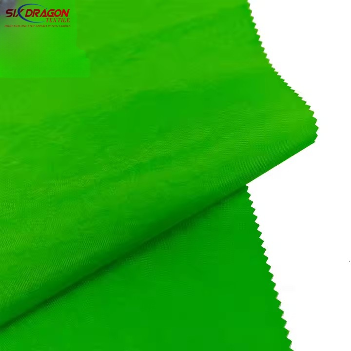 Finished green polyester fabric roll