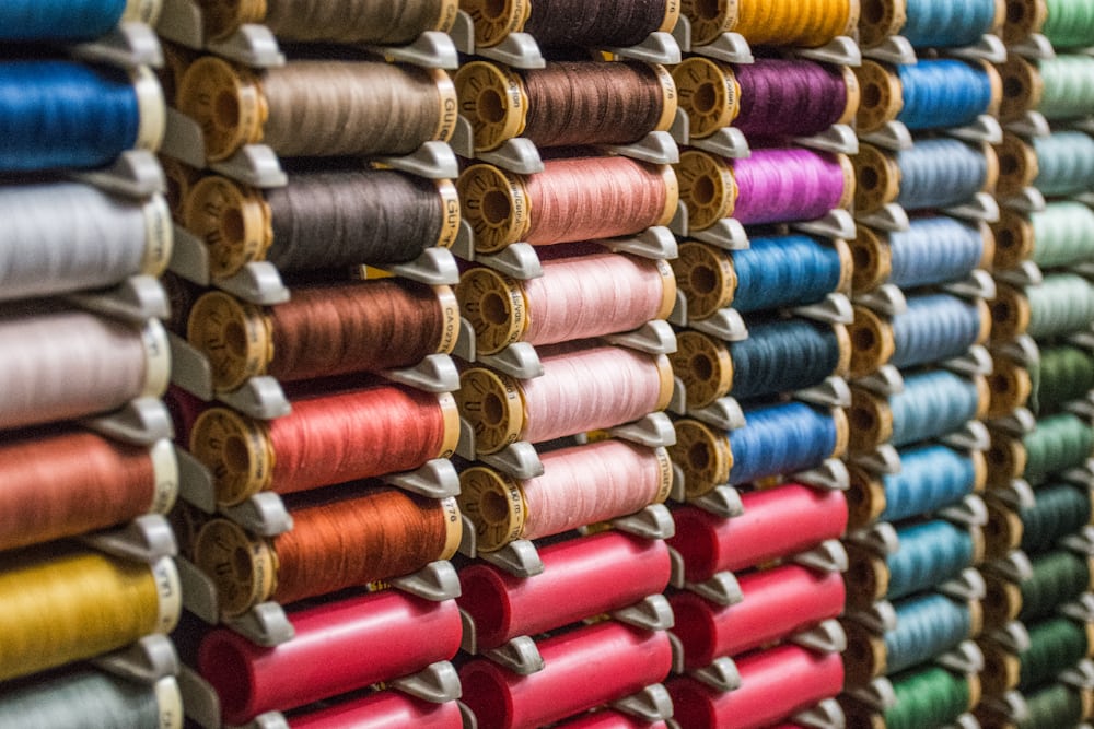Colored polyester and nylon yarn cones