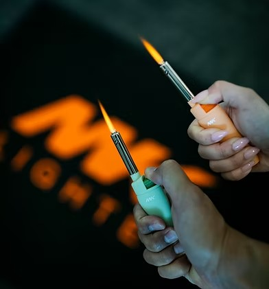 Lit MK Lighter with steady torch flame