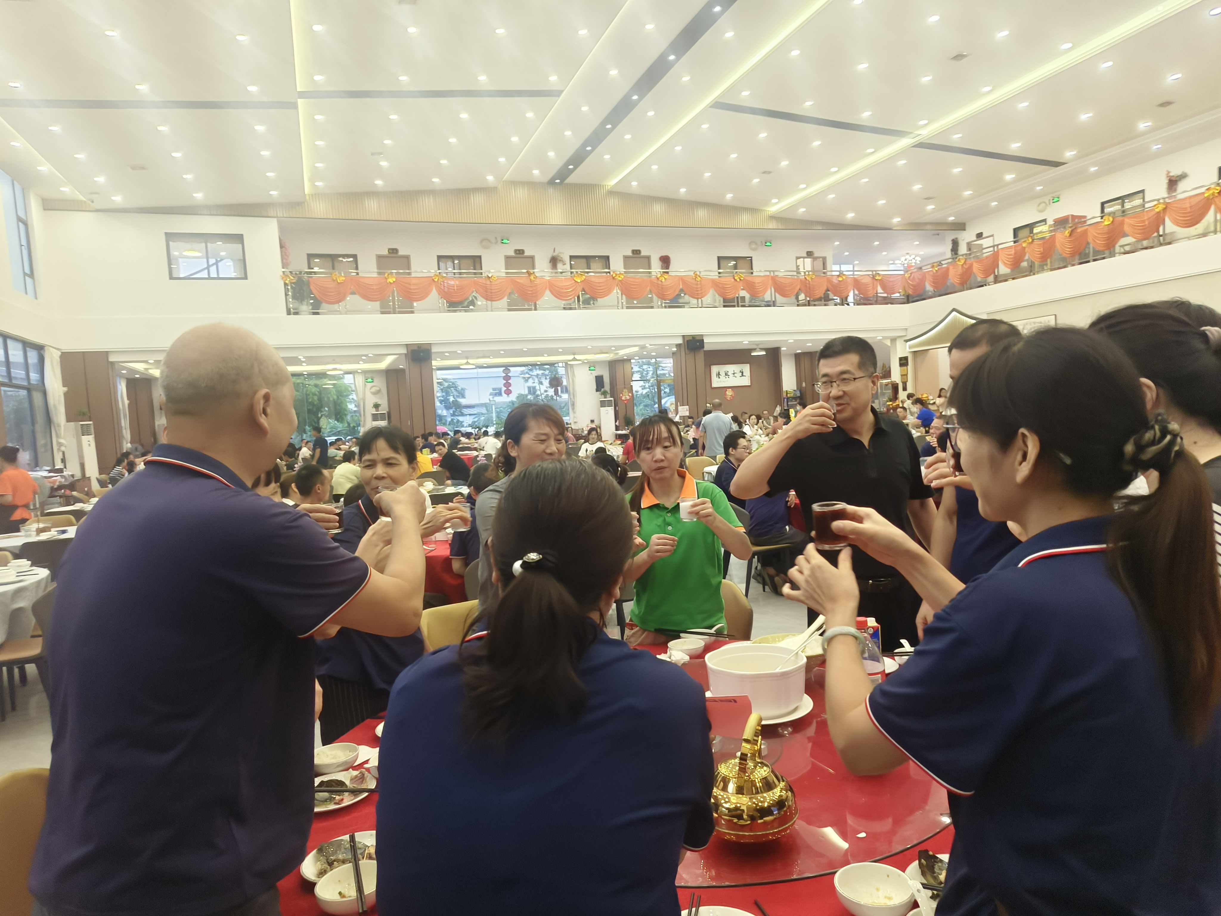 employees in wine cooler factory