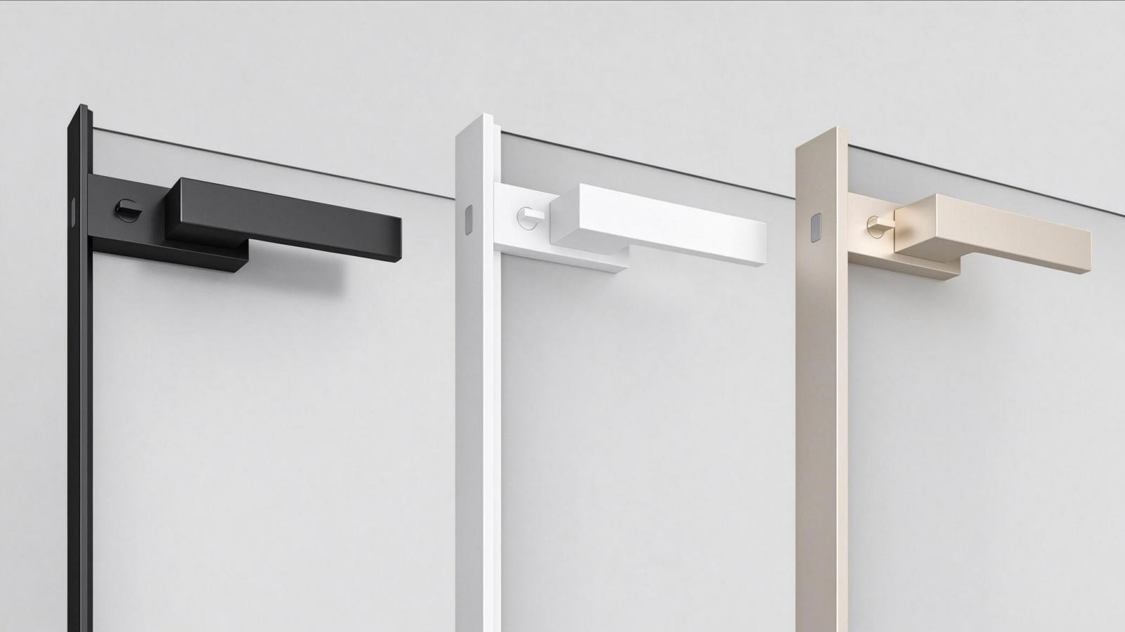 Close-up of a flush magnetic latch installed in a black aluminum door stile and frame