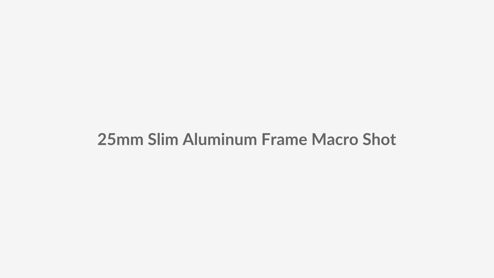 Macro product placeholder showing a 25mm ultra-slim aluminum framed glass partition profile with fine surface finish, narrow sightline detail, and clean glass-to-frame junction