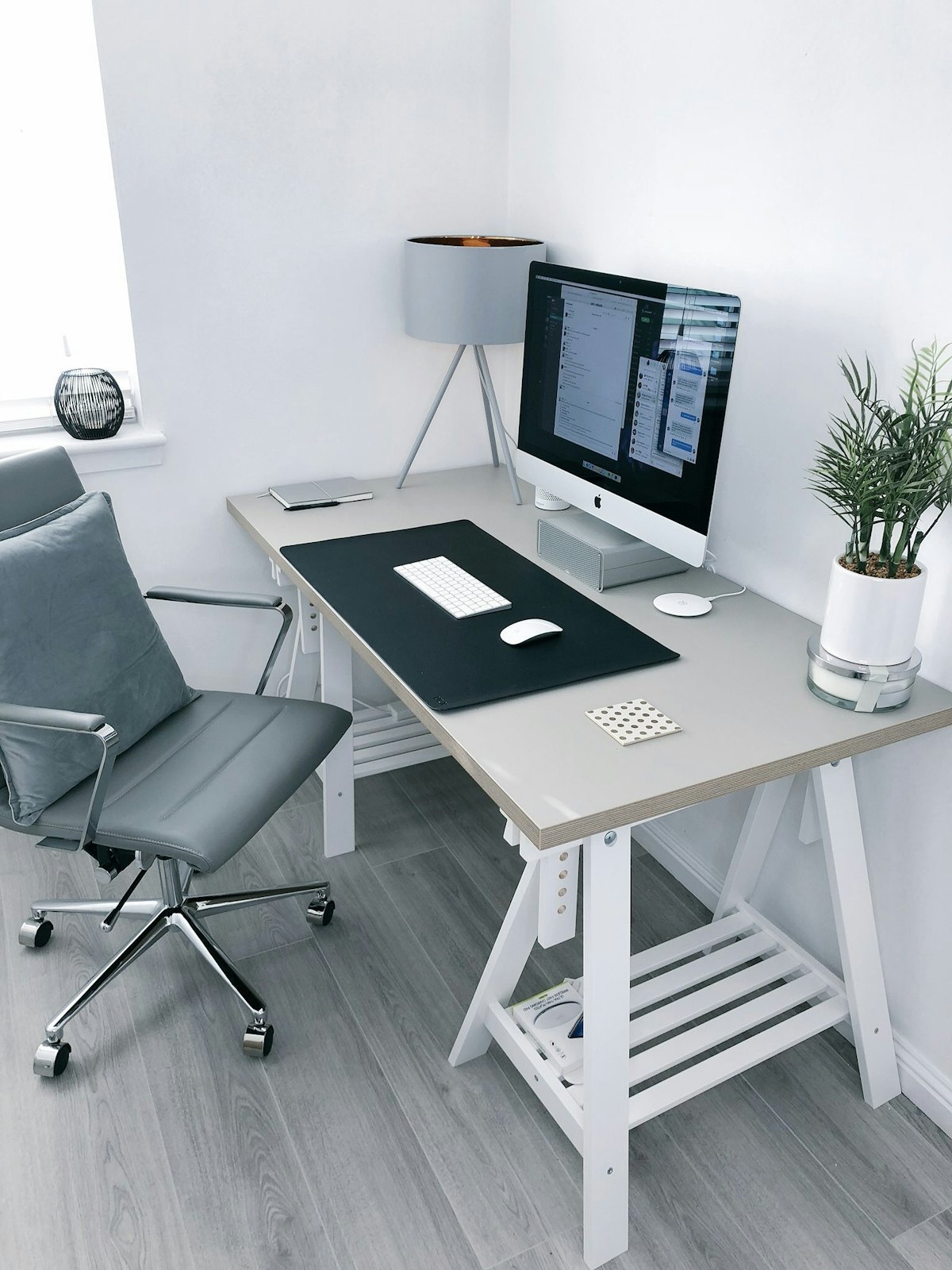 Home office with a manual sit-stand desk