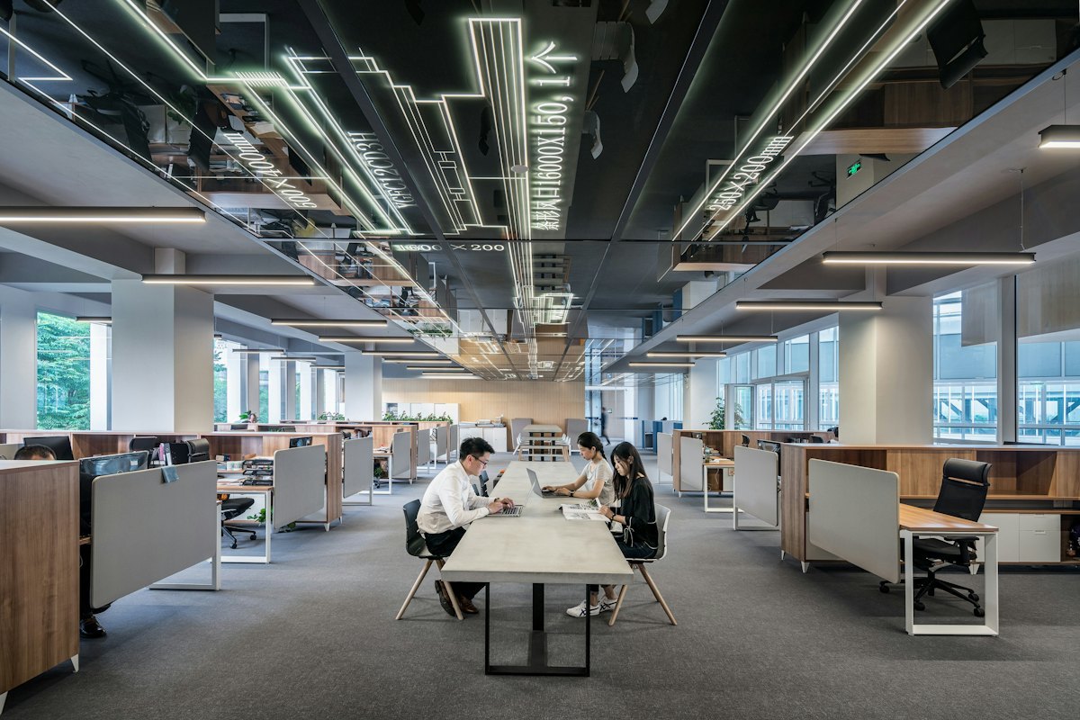 Office interior with height adjustable desks