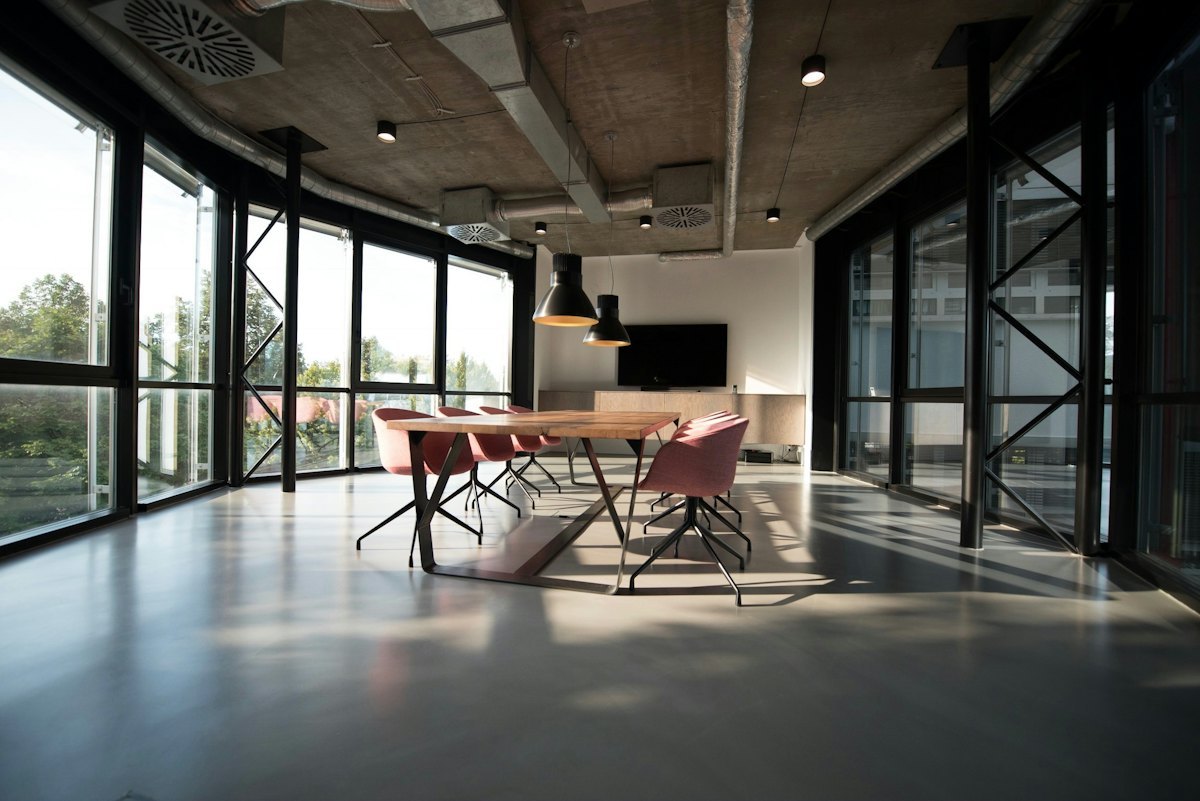 Height adjustable desks in a training room