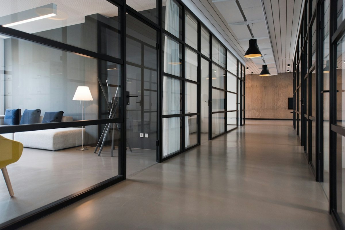 Mobile adjustable desk in a bright corridor