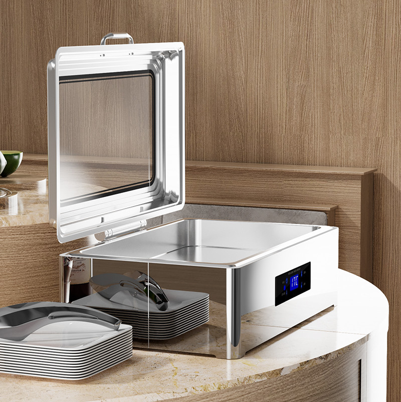 stainless steel chafing dish buffet set with glass lid on a buffet station