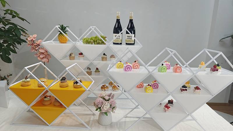 Compact multi-tier display stands for dim sum and tea service