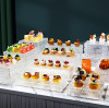 Présentoir à desserts LED en acrylique ondulé par PYEIN® : la touche finale parfaite pour votre buffet