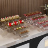 Présentoirs de buffet en acier inoxydable pour événements modernes et desserts