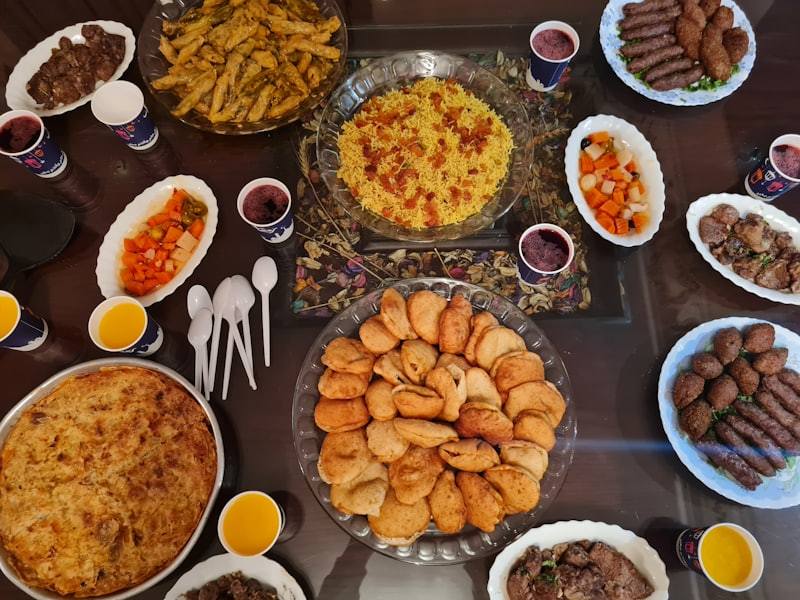 Middle Eastern iftar buffet spread with rice, bread, dates and traditional dishes