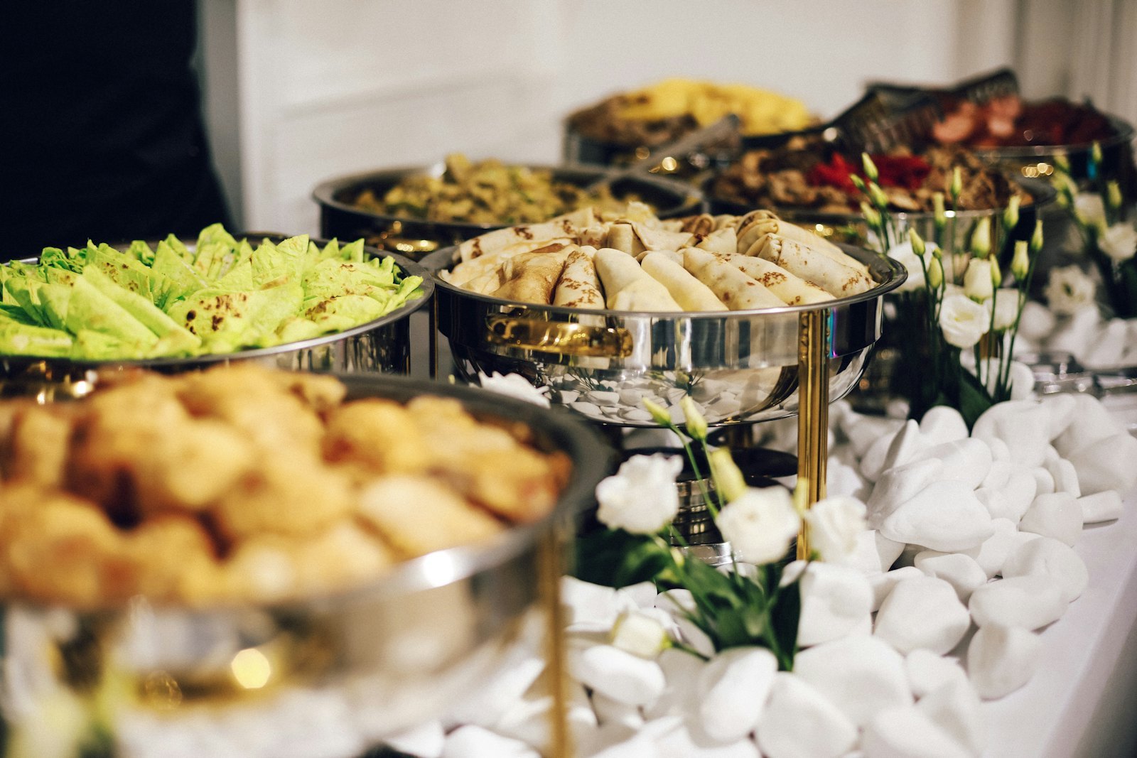 Middle East hotel buffet setup with premium stainless steel chafing dishes
