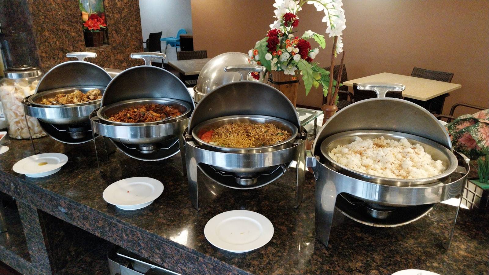 Buffet spread arranged with varied heights and clear guest flow