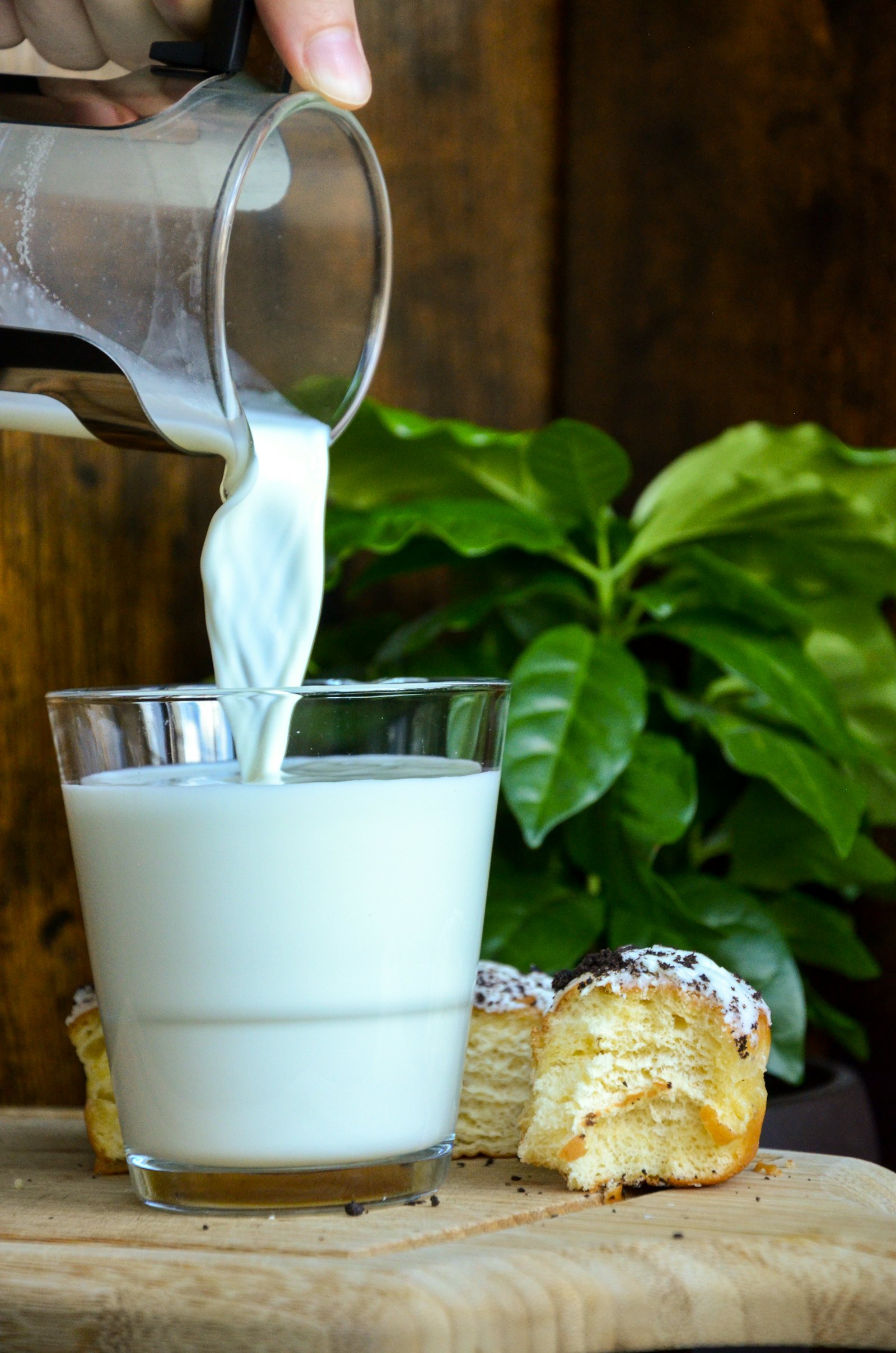 Milk being poured fresh at a breakfast service