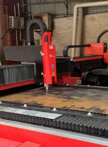 Laser cutting of stainless steel sheets in the PYEIN buffet equipment factory