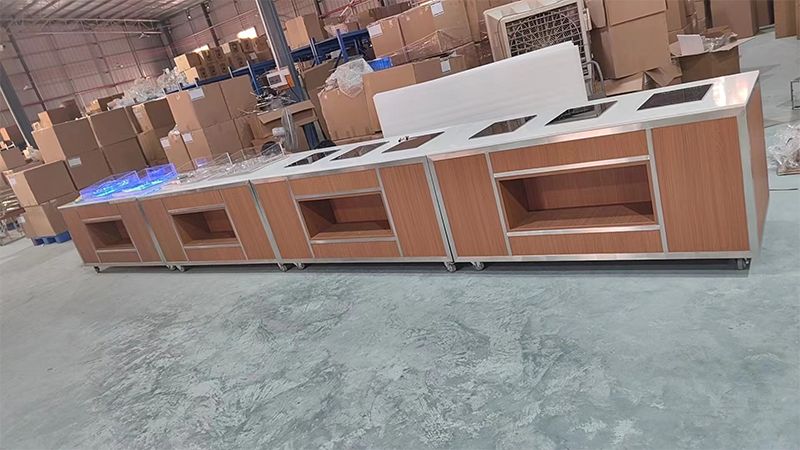 Multiple GH2114 modular buffet modules joined into a continuous line in the PYEIN workshop