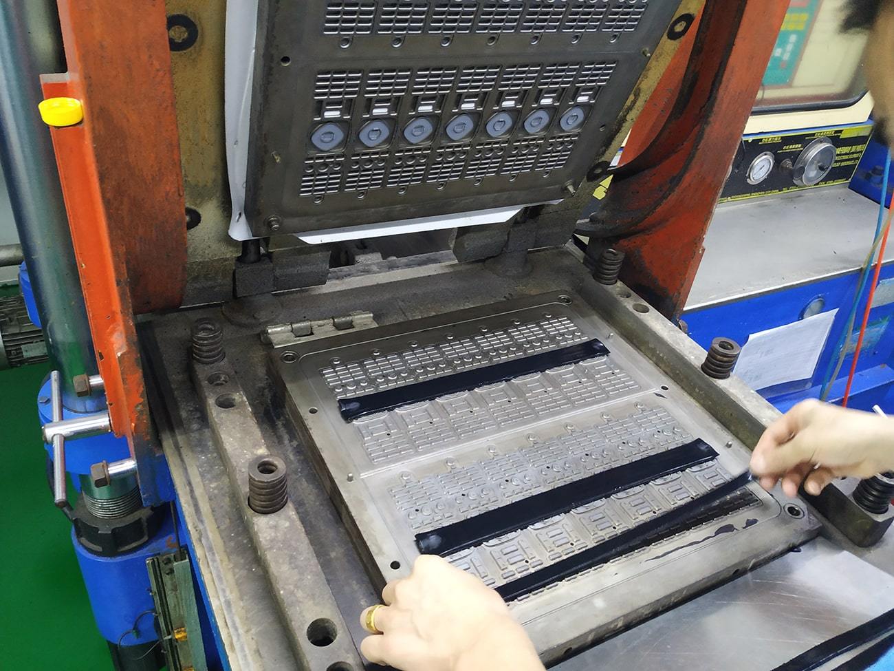 Silicone rubber parts manufactured by compression molding