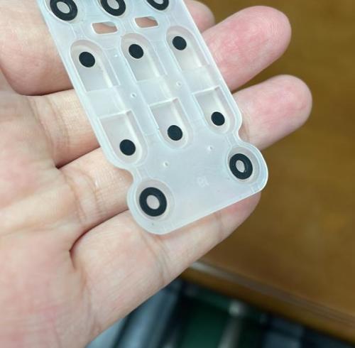 What's difference between conductive ink and Contact pill for a Silicone keypad?