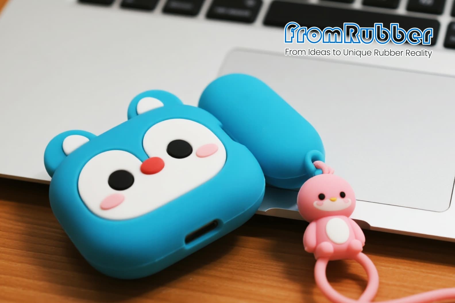 Silicone earphone case with attached keyring hook