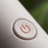 Cost difference: plastic button vs. silicone button for electric toothbrush