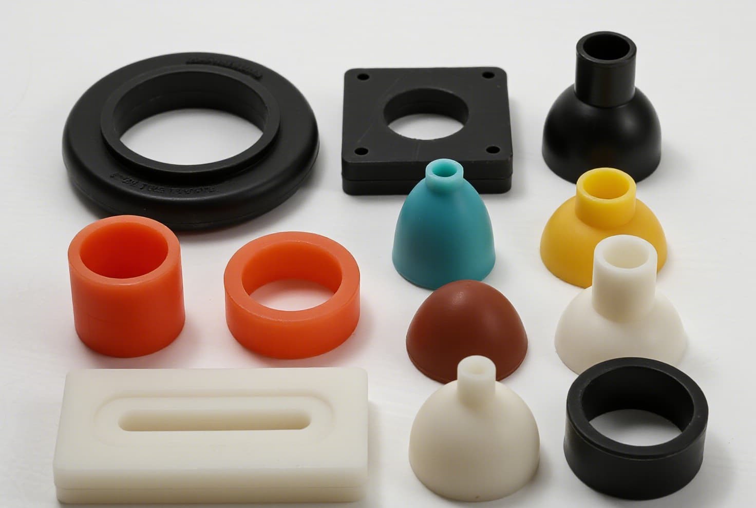 Various silicone seals and gaskets on industrial workbench