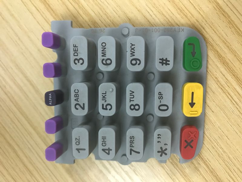 Multi-color custom silicone telephone keypad with raised numeric and color-coded function keys