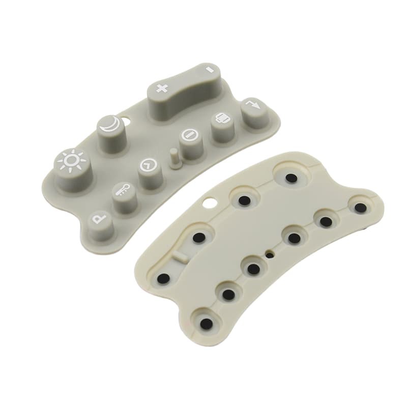 Silicone keypad with printed icons and underside carbon pill contacts