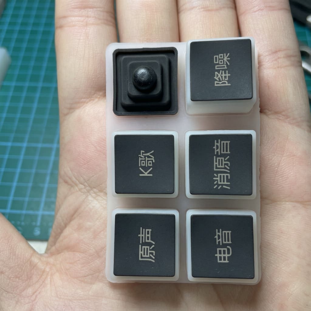 Conductive carbon pill contact on keypad back