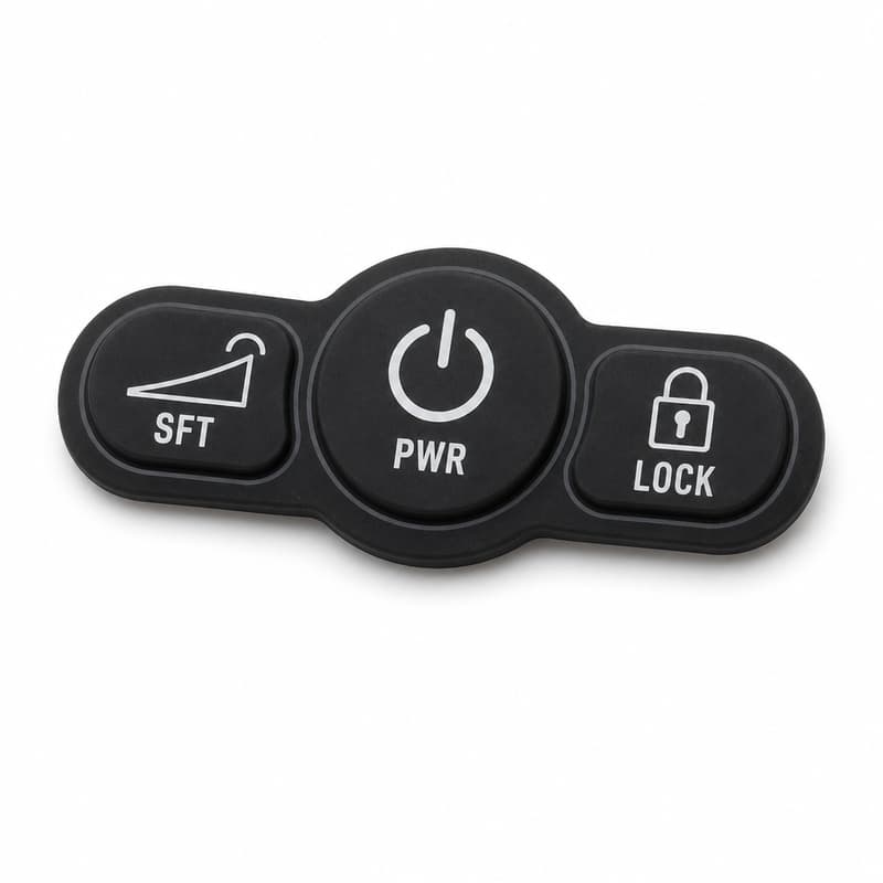Cordless screwdriver silicone keypad with a large central PWR key flanked by SFT and LOCK capsule keys