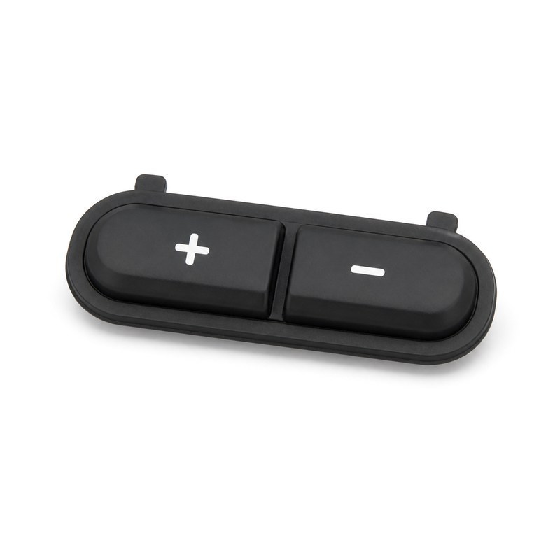 Two-key molded silicone rocker keypad with plus and minus symbols and moulded locating tabs for a wearable device