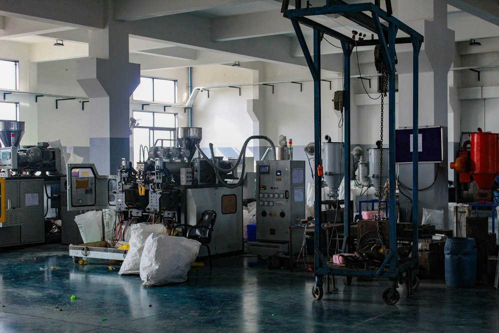 Injection molding workshop with machinery and equipment in operation