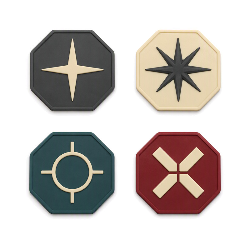 Moulded silicone cap badge patches in octagonal form with raised two-colour geometric emblems