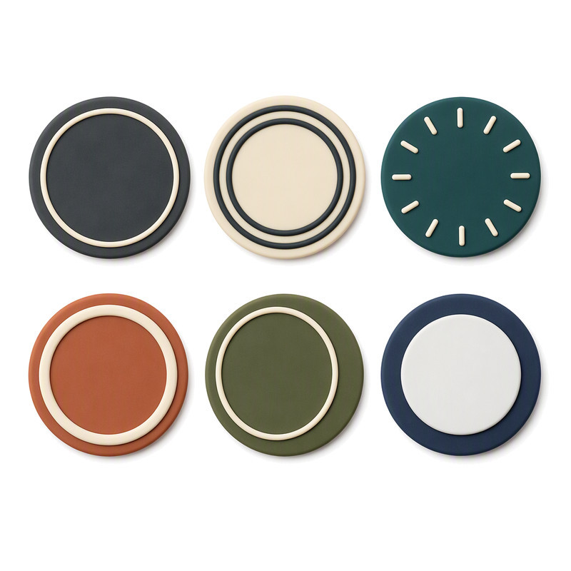 Moulded silicone patches with concentric ring relief and tick motifs showing edge and wall definition