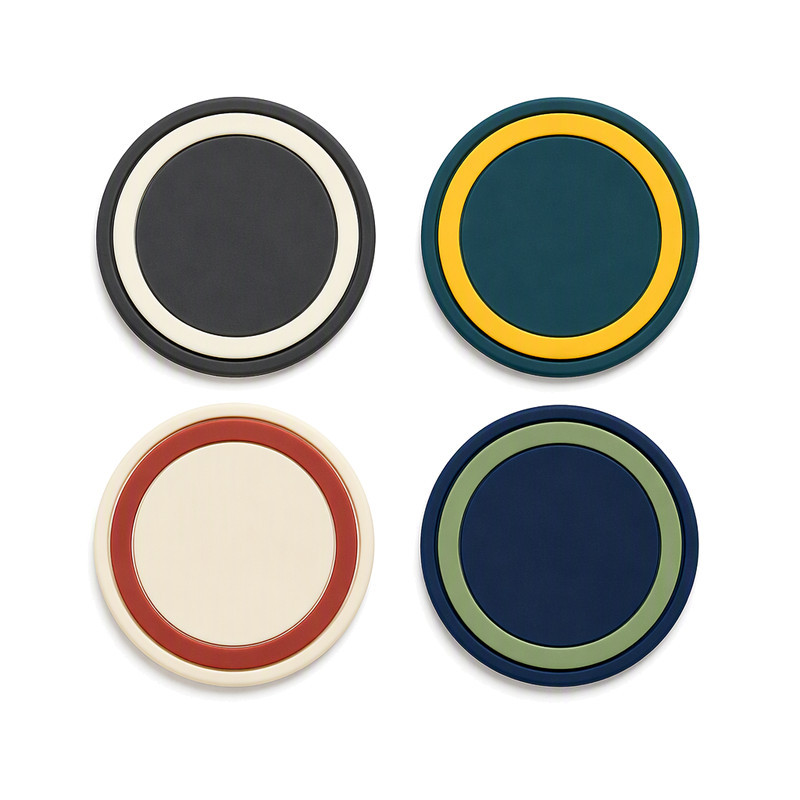 Two-colour moulded silicone labels with concentric ring bands showing clear colour boundaries between adjacent colour areas
