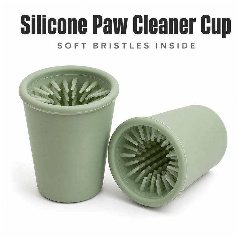 Two OEM silicone dog paw cleaner cups in sage green, one upright showing the soft internal fingers and one lying on its side