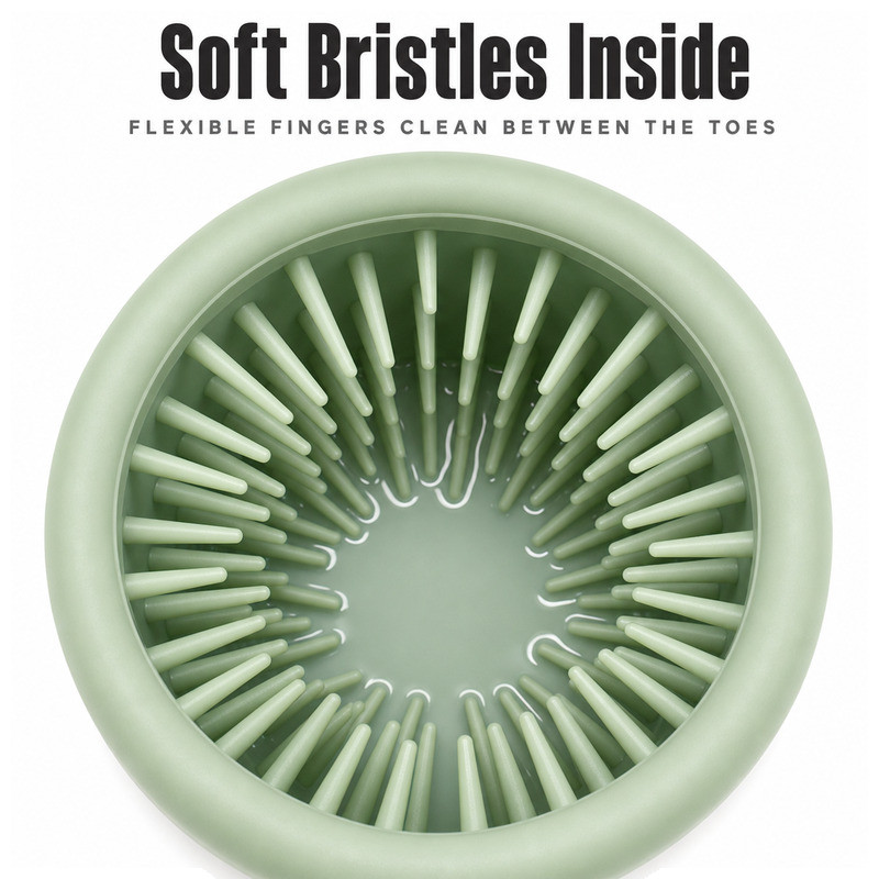 Top view of the moulded silicone finger array inside a dog paw cleaner cup, showing finger spacing, root thickness and the open centre