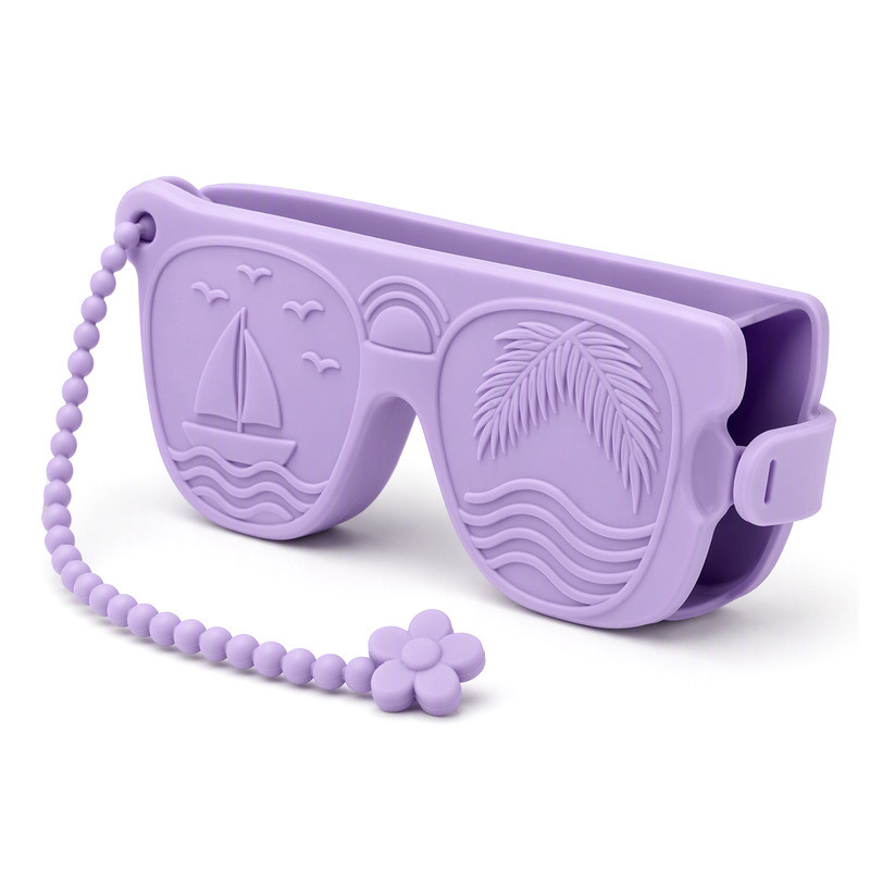 Lavender silicone sunglasses case with embossed sailboat and palm relief, open side slot and beaded lanyard