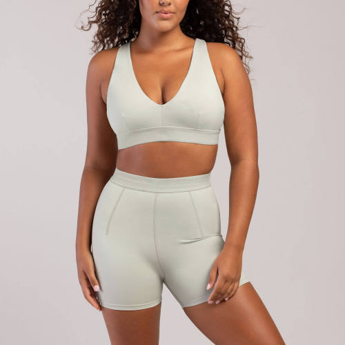 V Neck Sports Bra Manufacturer | Custom Biker Shorts Set With Hidden Pocket Supplier