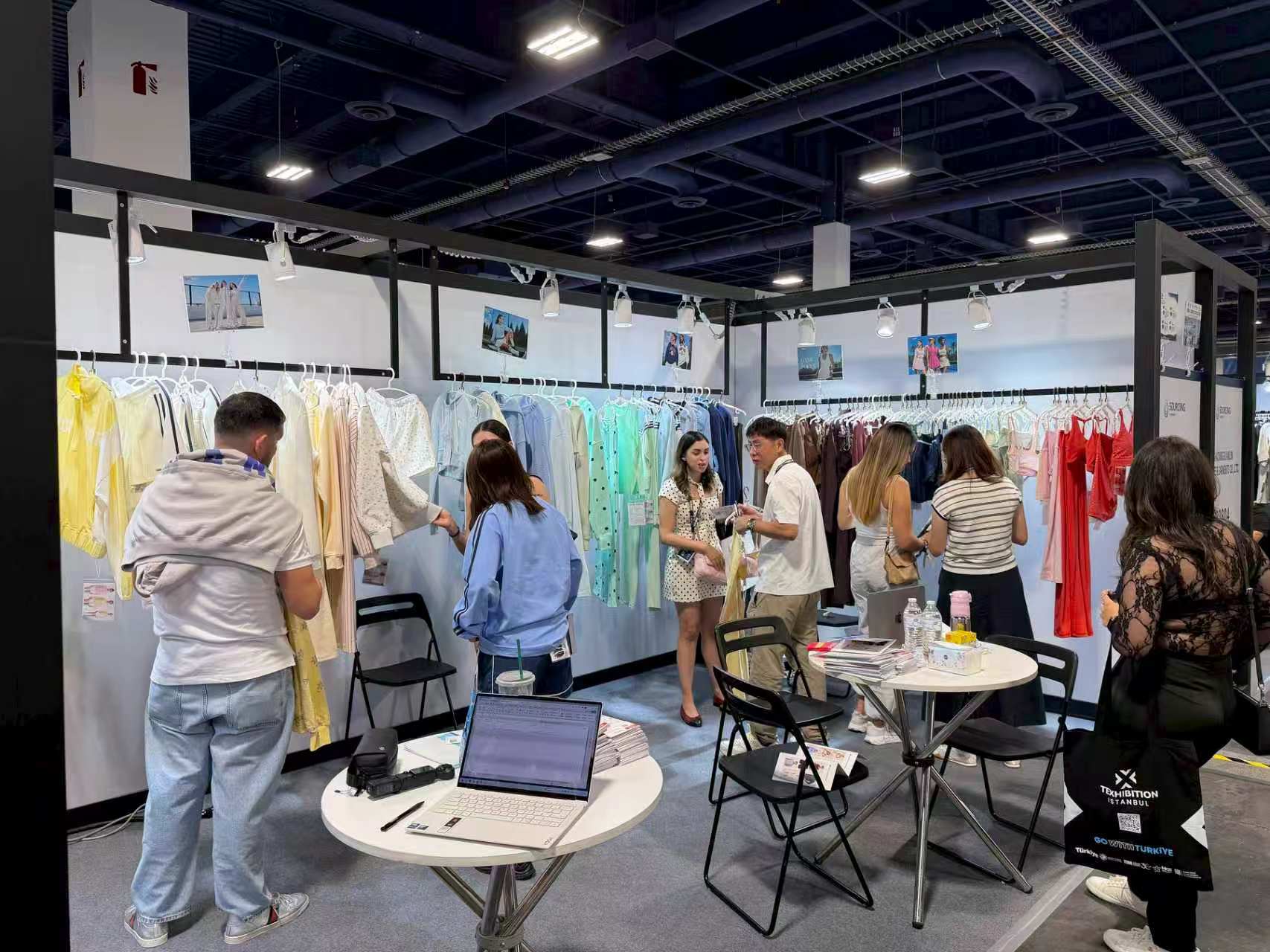 Buyer reviewing Eationwear samples at MAGIC 2026