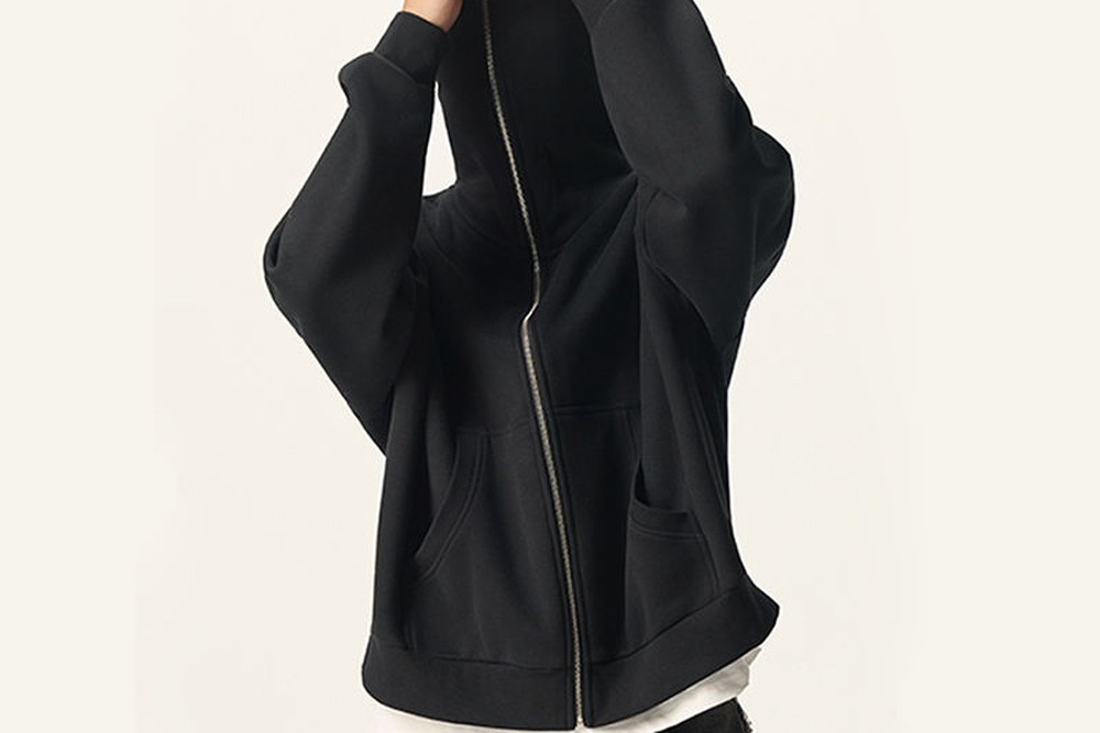 Heavyweight 500 GSM zip hoodie sample from a hoodie manufacturer, boxy drop-shoulder fit with ribbed cuffs