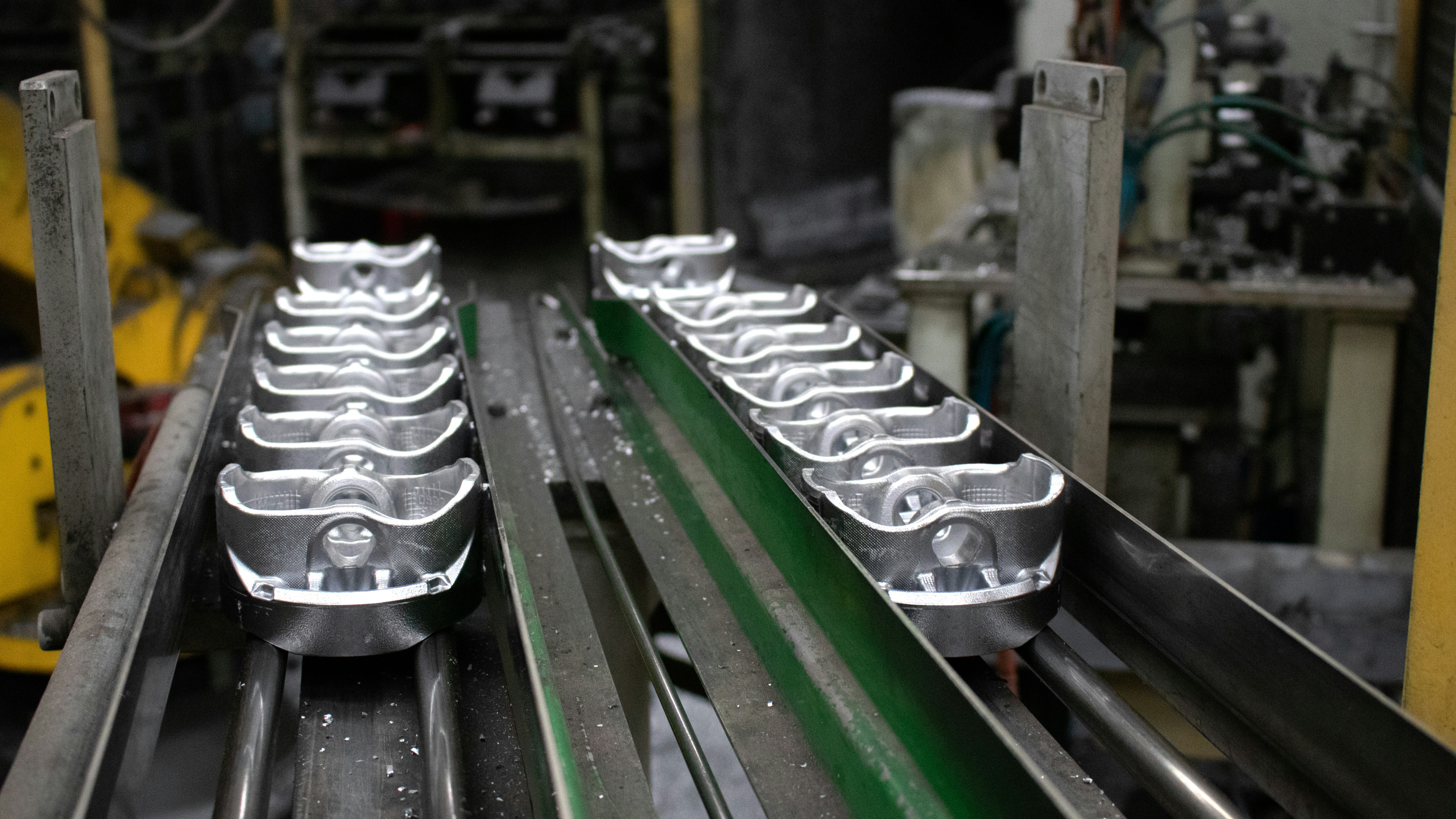 An assembly line showcasing the production of custom metal stamped parts
