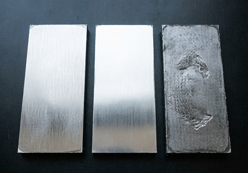 Various powder-coated sheet metal parts in different colors