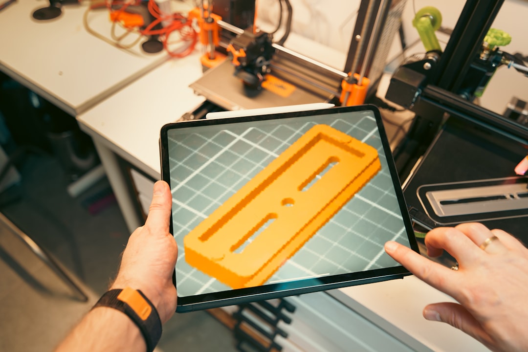 Engineer reviewing a sustainable CNC machining process on a tablet