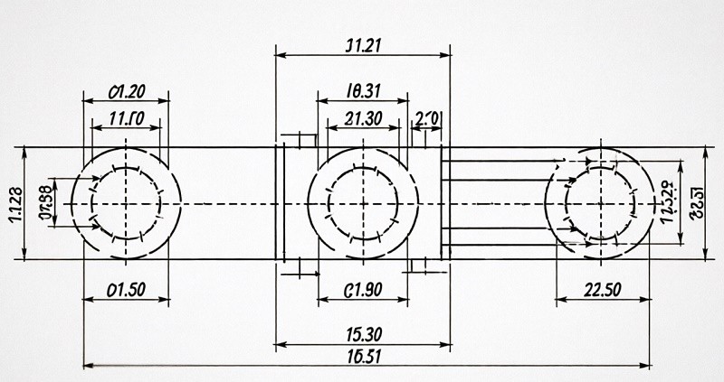 A technical drawing for a CNC machined part with GD&T symbols and dimensions