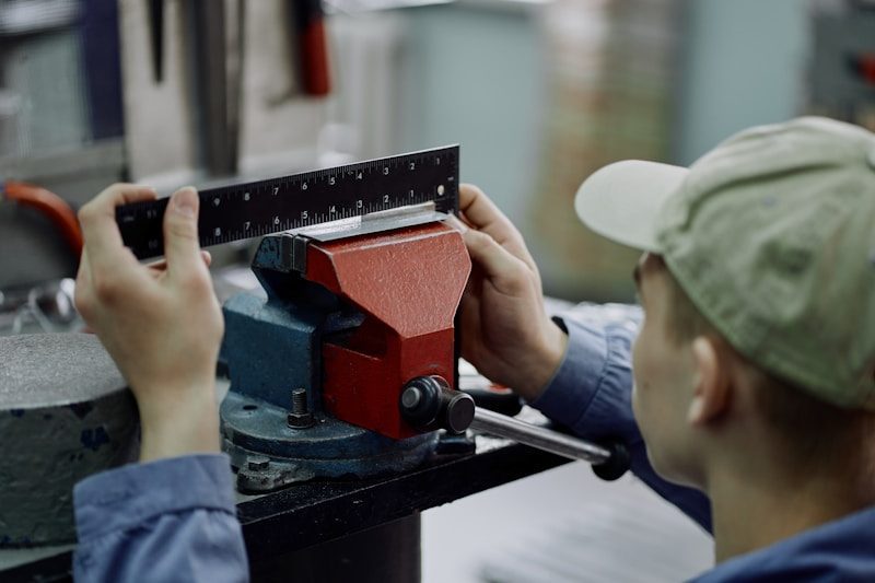 Precision CNC machined parts with slip fit features inspected in a workshop