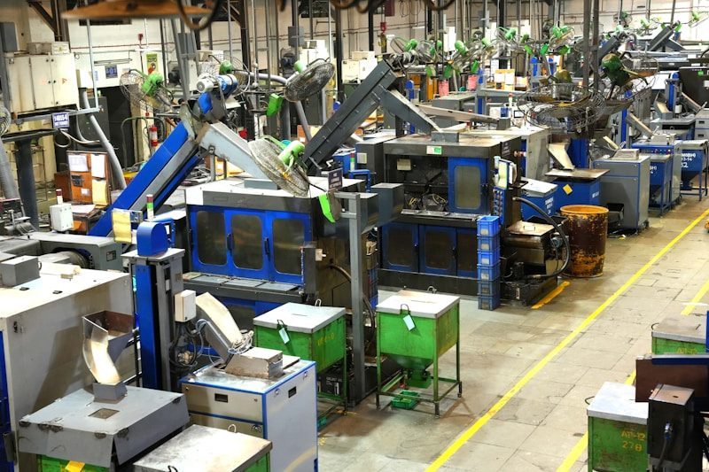 Factory floor with machinery illustrating hybrid CNC and injection molding production
