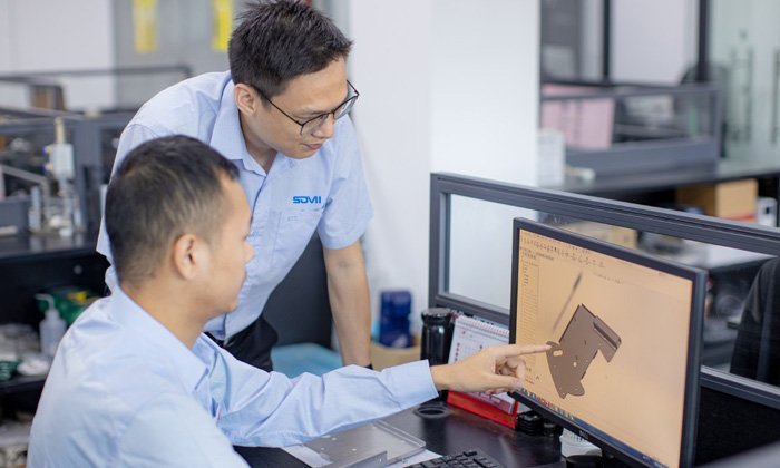 CNC machine performing micro milling of precision metal parts