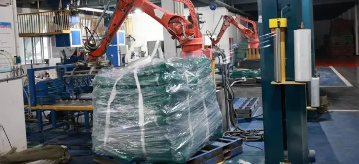 Automatic palletizing line preparing EPDM granule bags for shipment
