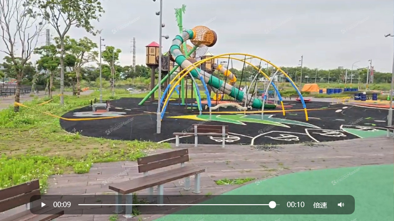 Jack Wu supervising EPDM installation process for FieldsMaster playground project