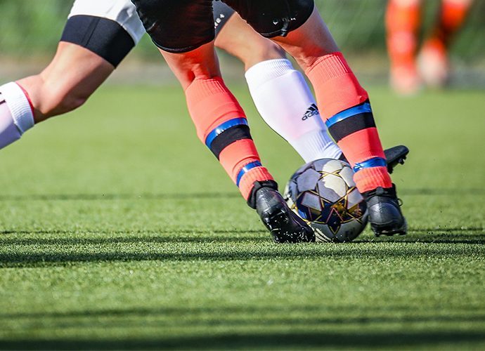 FieldsMaster turf infill application on an artificial grass field